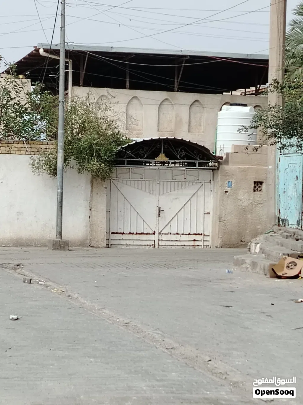 بيت بالقبله حي الجامعة قرب البريد موقع ممتاز قريب ع الشارع