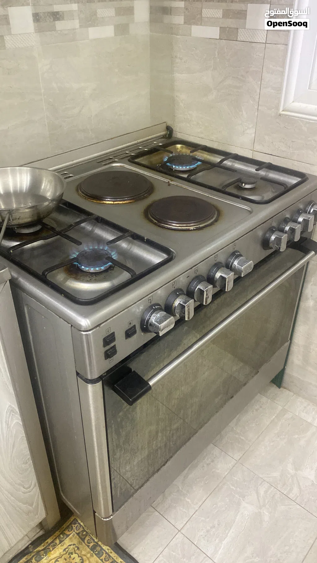 فرن اربع عيون وشوله كهرباء حجم كبير عيون غاز ازرق .