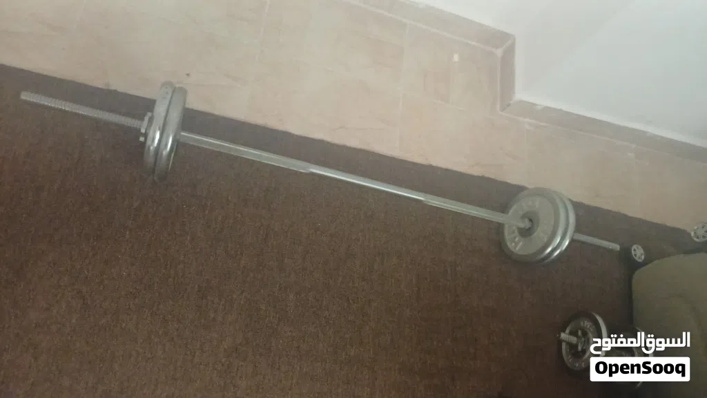 بار طويل مع 20 كيلو وزن + بار قصير مع 5 كيلو وزن استخدام خفيف