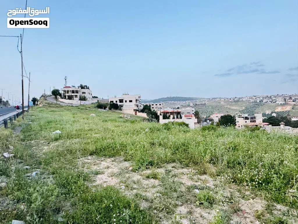 قطعه ارض للبيع في جرش طريق اربد عمان واجهه على الشارع 65 م تجاري