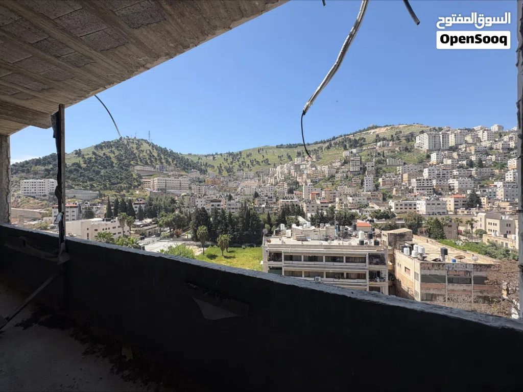 فرصة استثمارية وسكنية مميزة – وحدات متعددة الاستخدام في موقع استراتيجي على شارعي فيصل والحرية