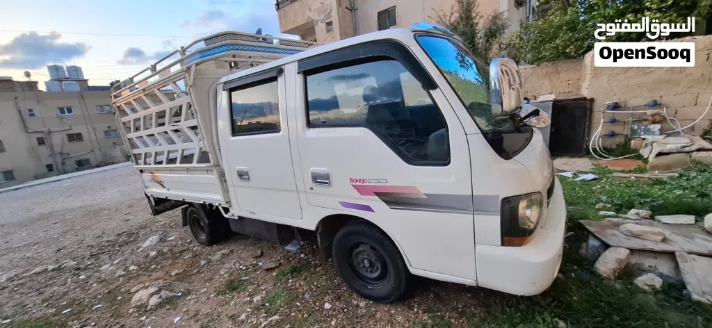 كيا دبل كبين لون ابيض فحص ممتاز عجال جاد بطارية جديدة جير ممتاز اكسات ممتازة
