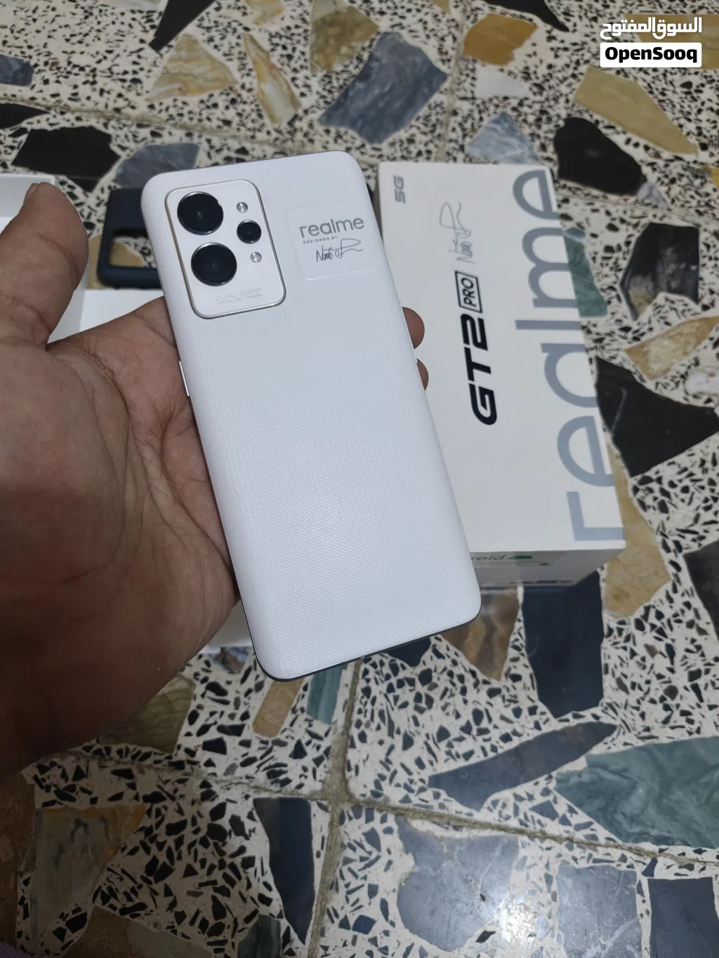 ريلمي gt 2 pro نسخة عالمي اذكرة 256 رام 12 نظافة 99% للبيع سعر 375 مجال بسيط عنواني بغداد اي استفسا