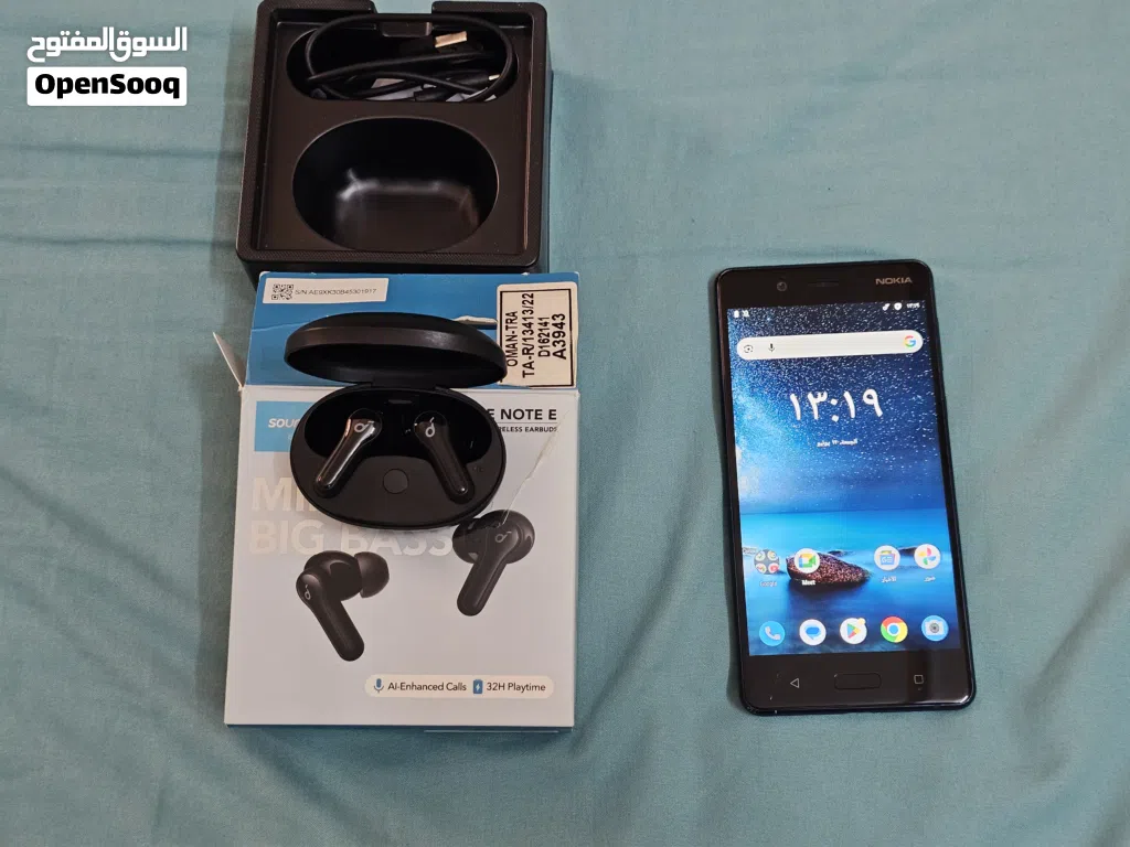Nokia 8 phone with Bluetooth earphones