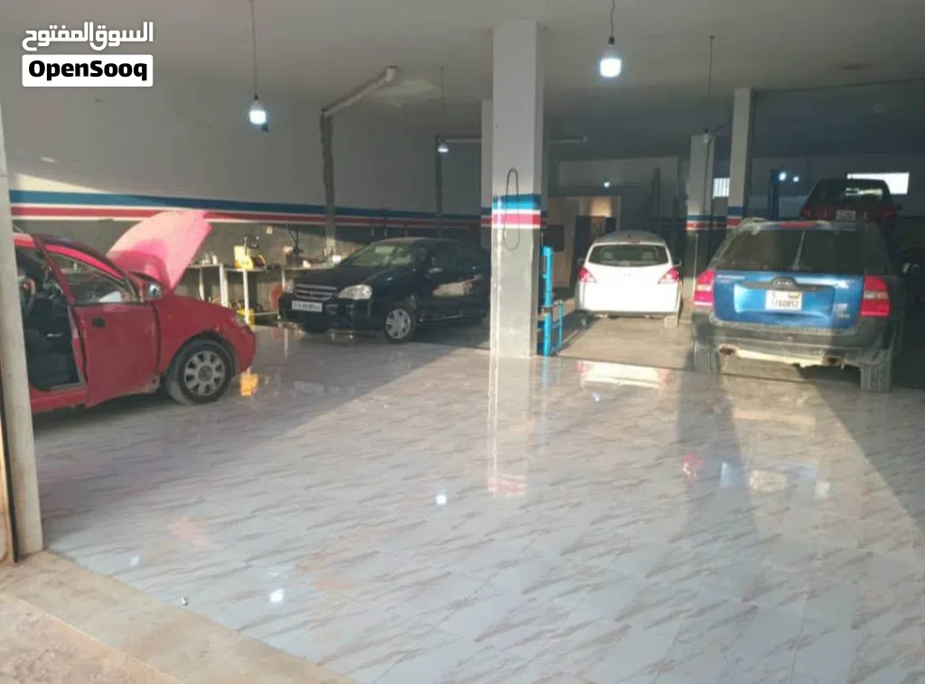 مركز ميكانيكا وكهرباء بكامل المعدات وموقع ممتاز على الرئيسي للبيع عتبة كاملة