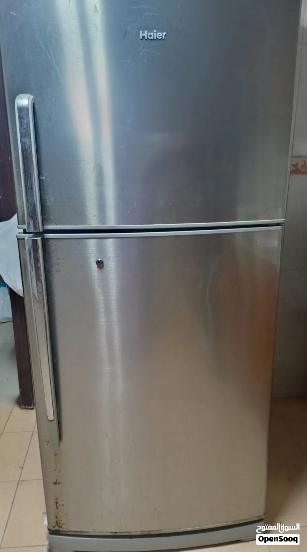 fridge and electric stove and oven