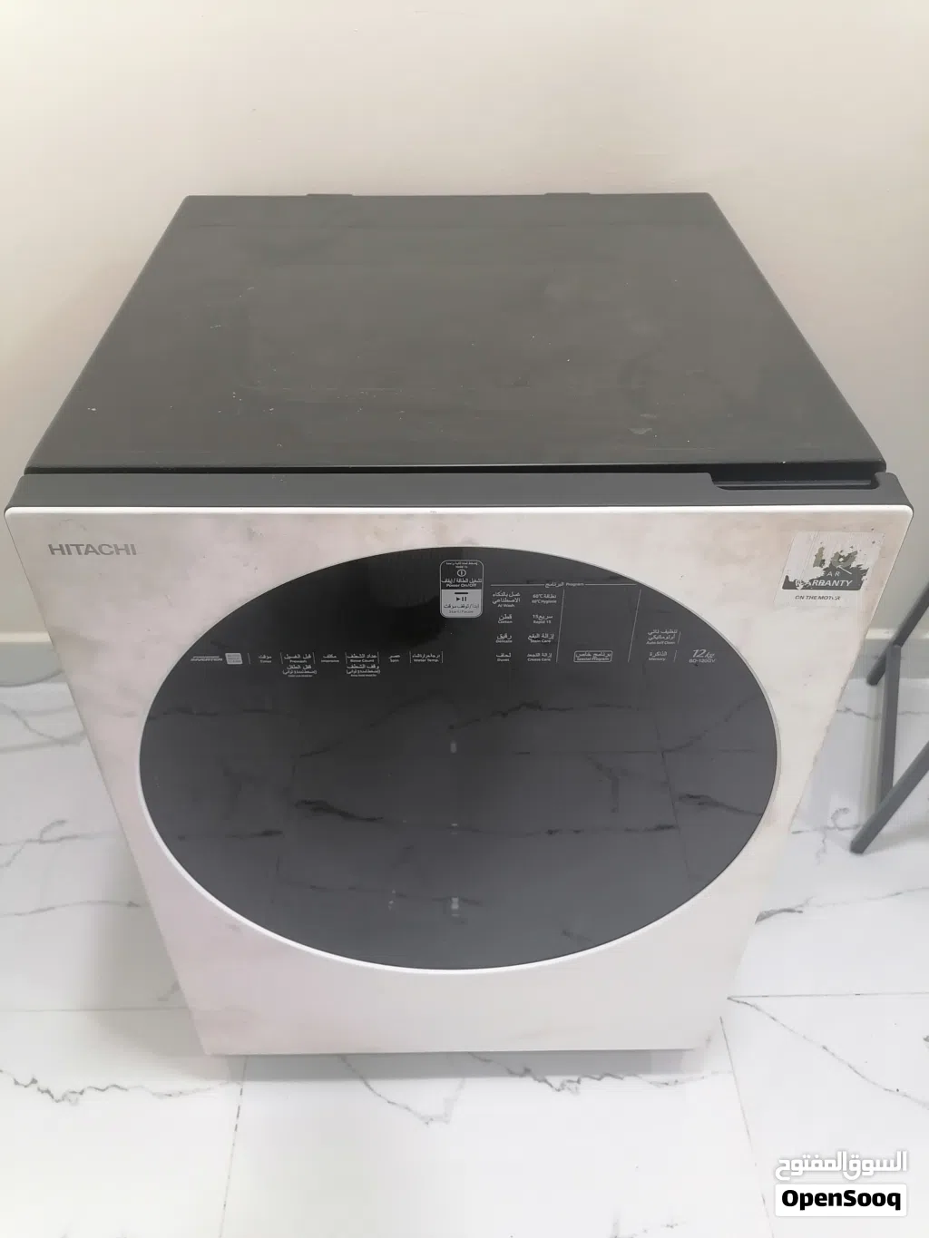 للبيع غسالة هيتاشي أوتوماتيك فيها مشكله الدرام Hitachi automatic front-load washing machine, 12 kg