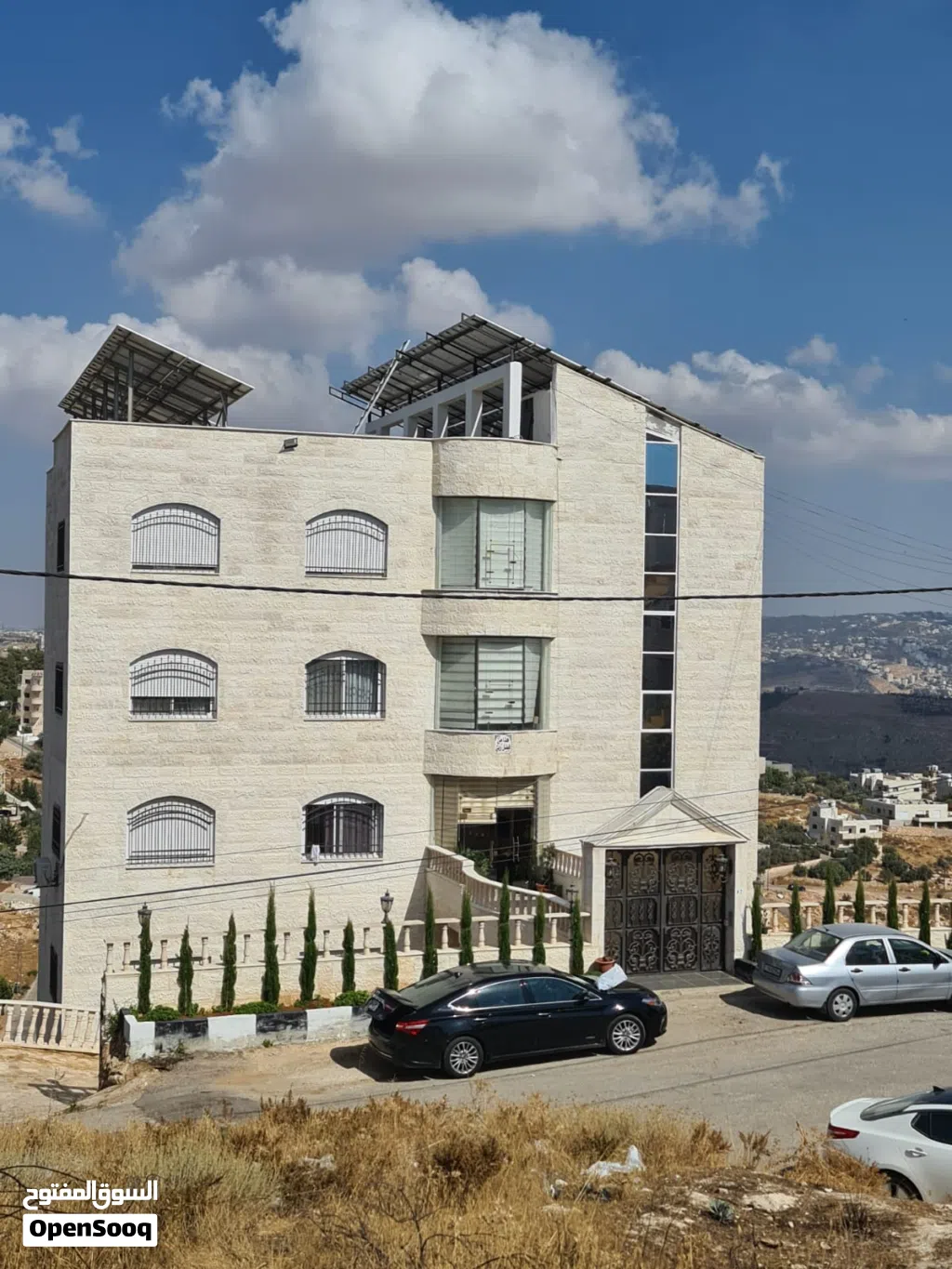 عمارة سكنية شارع الستين وليست اسكانات خمس طوابق وتسوية شقق طابقية كل شقة طابق مساحة كل شقة 266 متر