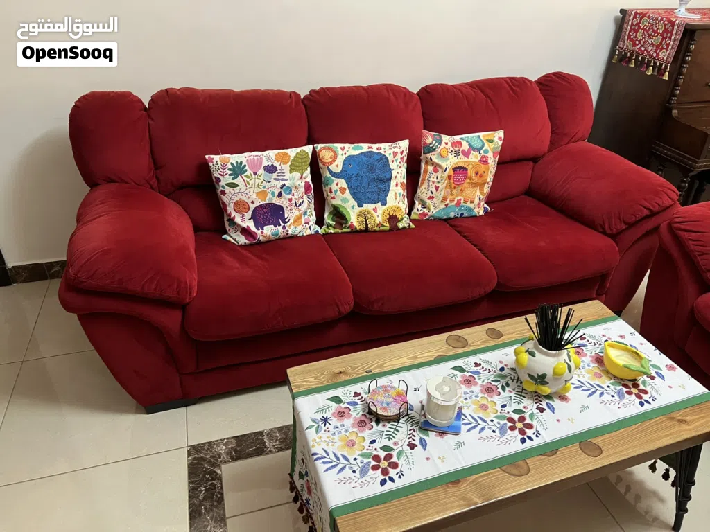 Comfortable and stylish red sofa set in very good condition.