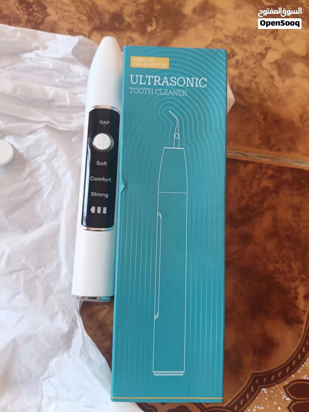 جهاز تنظيف الأسنان وإزالة الجير بالموجات فوق الصوتية (Ultrasonic Tooth Cleaner).