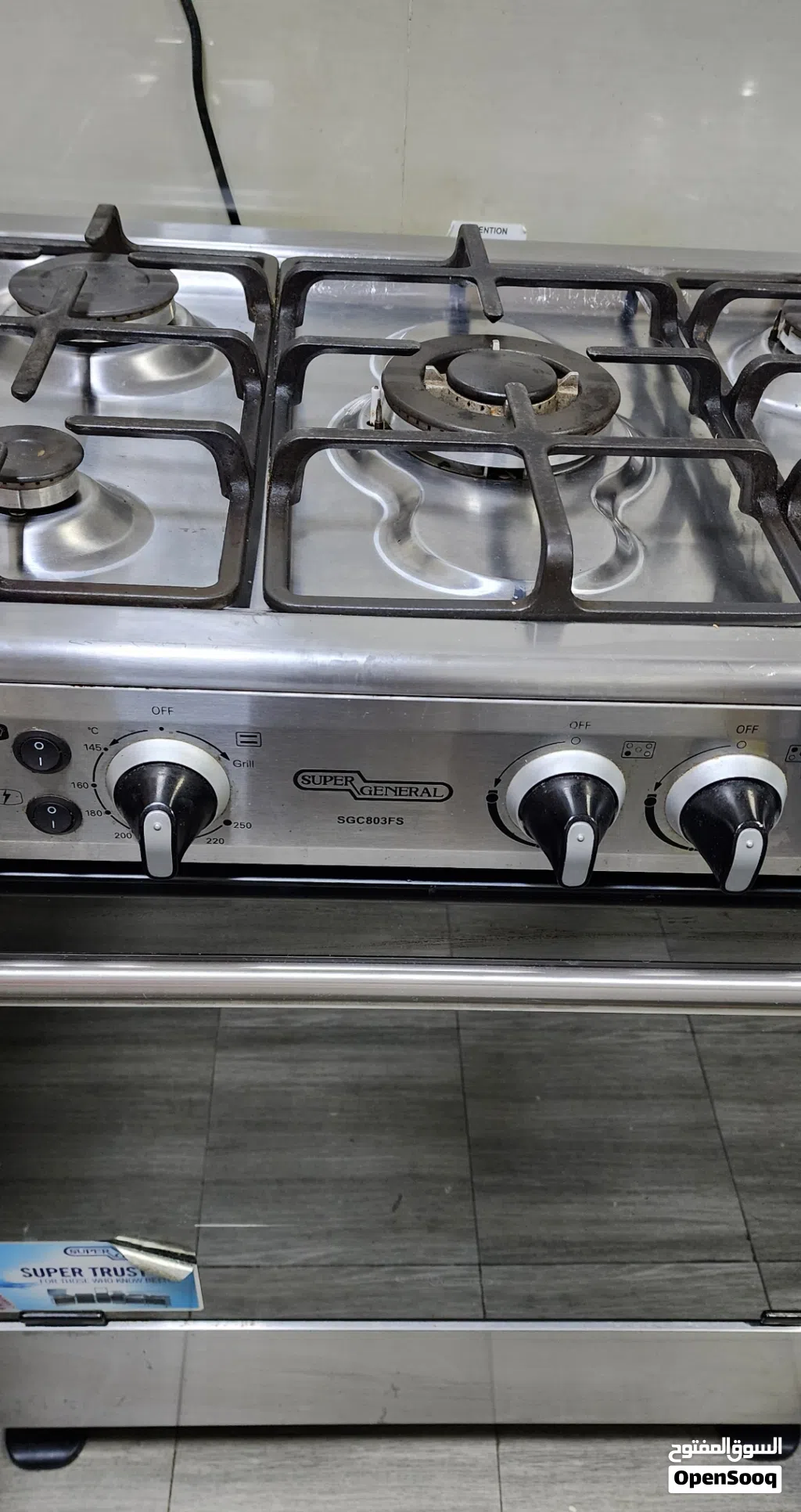 طباخ مع فرن غاز 5 عيون 80cm ماركة supergeneral في حالة ممتازة cooker and oven