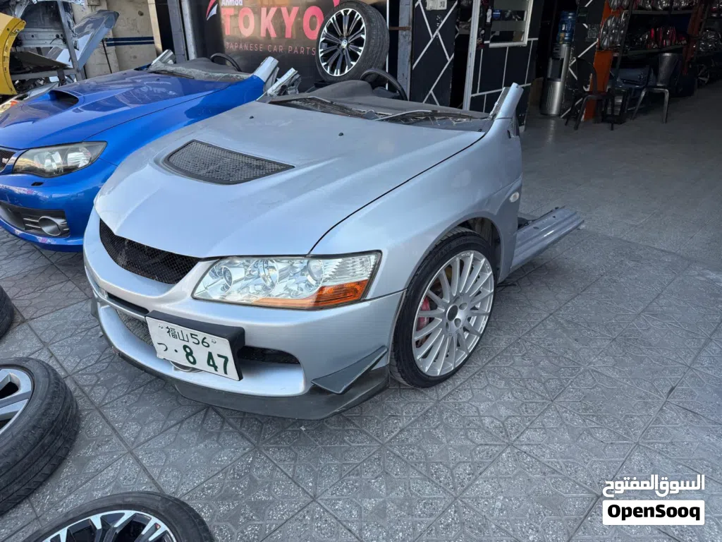 Mitsubishi Lancer Evolution 9 وارد اليابان ممشى قليل بحالة ممتازه متوفره كامله