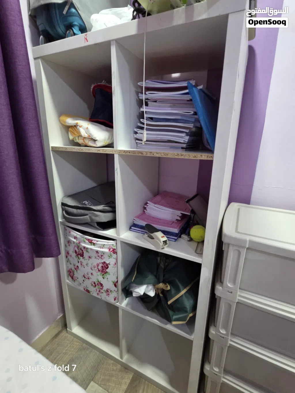 shelf for storing books games clothes