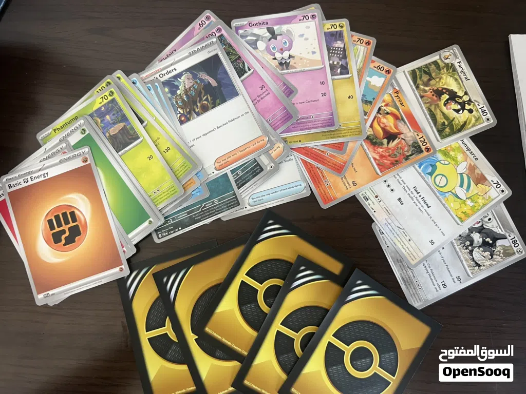 40 Assorted Pokemon Cards with 5 Gold Card Protection Sleeves