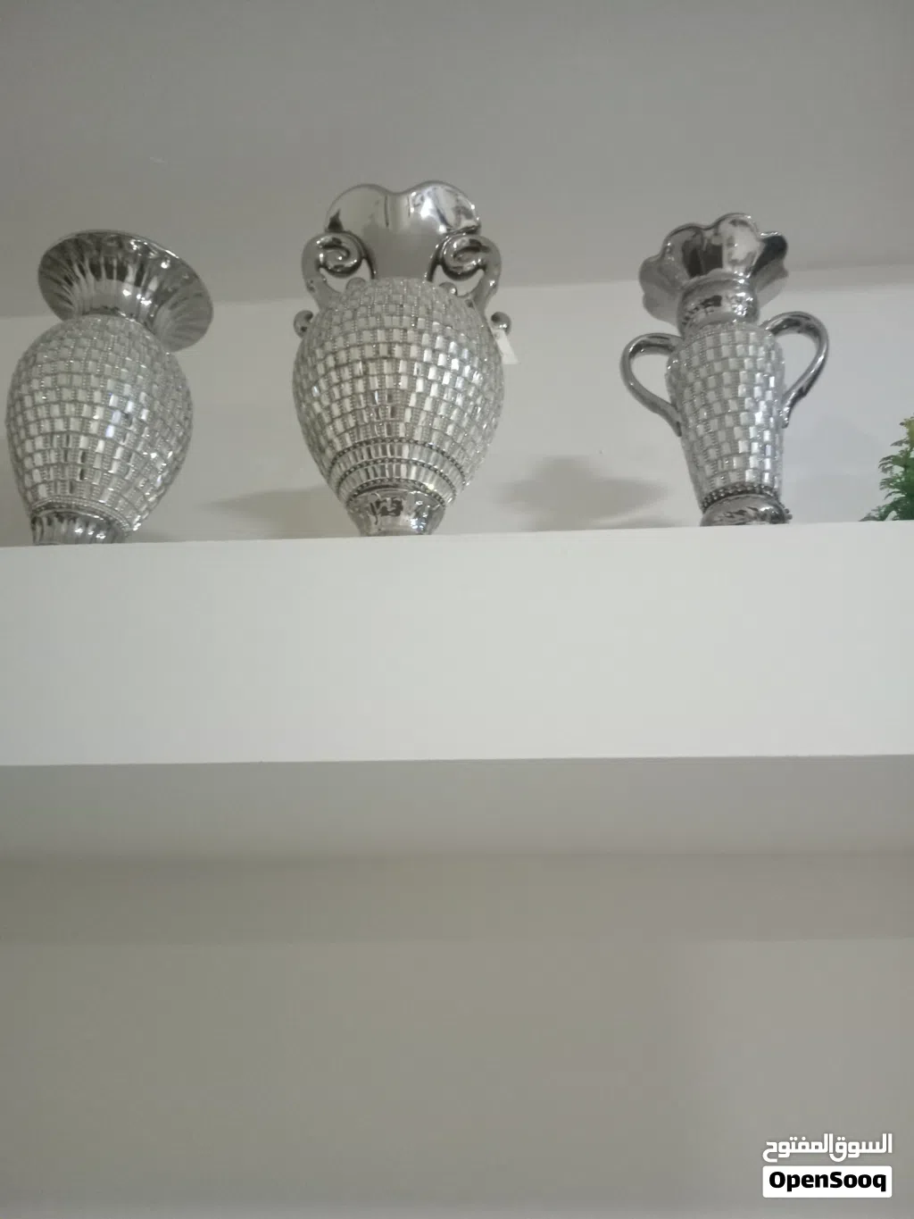 مزهريات وشمعدانات