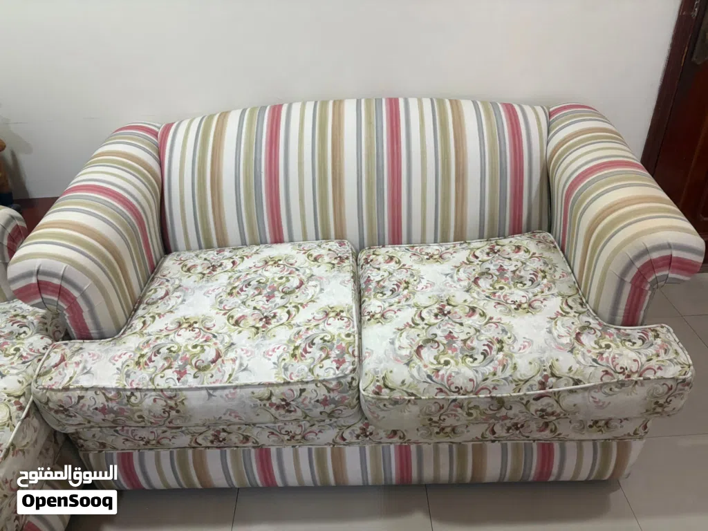 Seven seater sofa set with 6 cushions, one teapoy and four side tables Negotiable