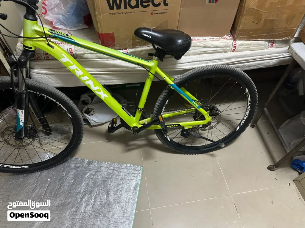 للبيع: دراجات جبلية من طراز Trinx M116 (أو M116 Pro) بإطار أخضر فسفوري لامع. تأتي بإطار من الألومنيو