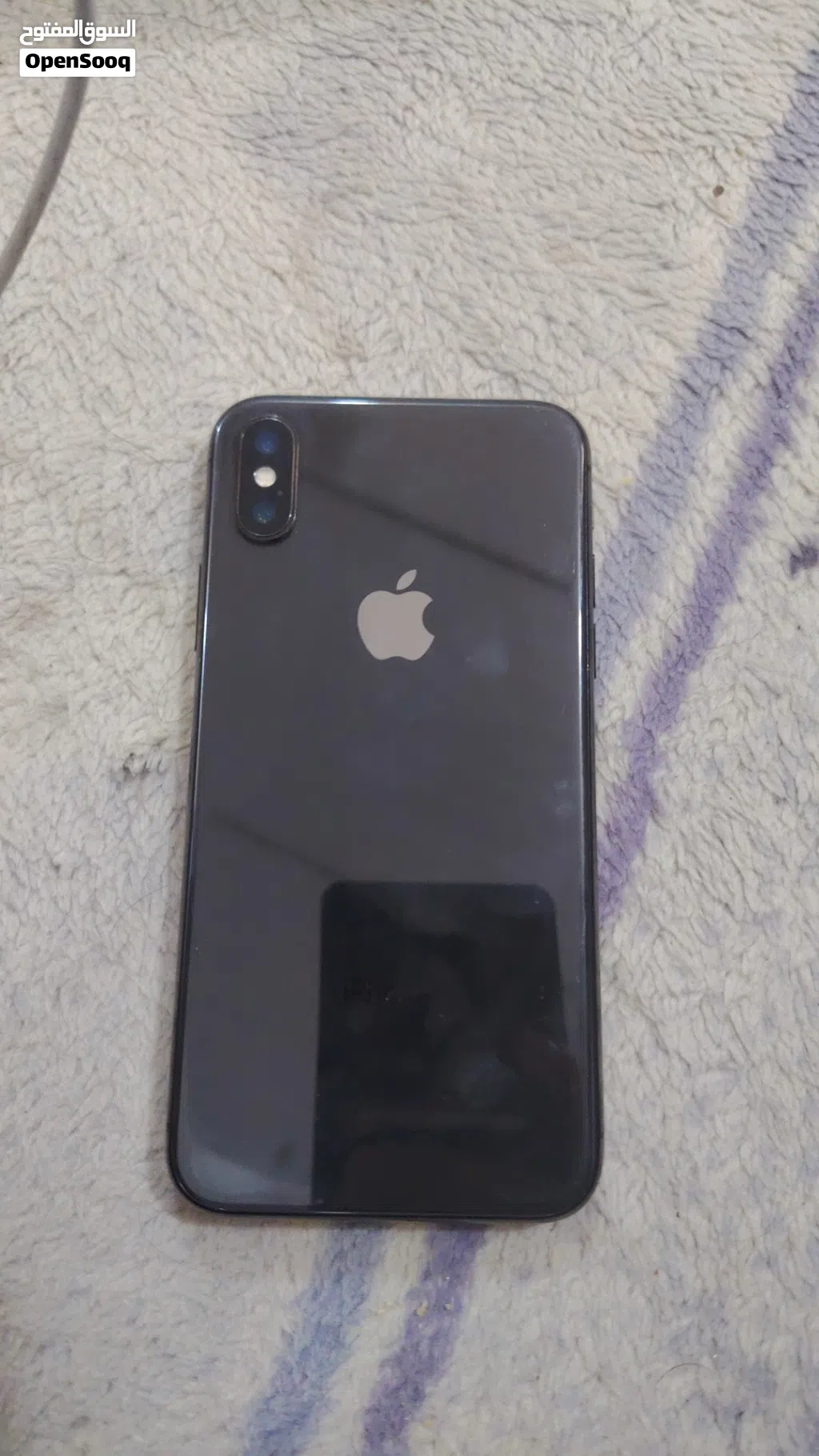 ايفون اكس ذاكرته 256 بطاريته 100اصليه