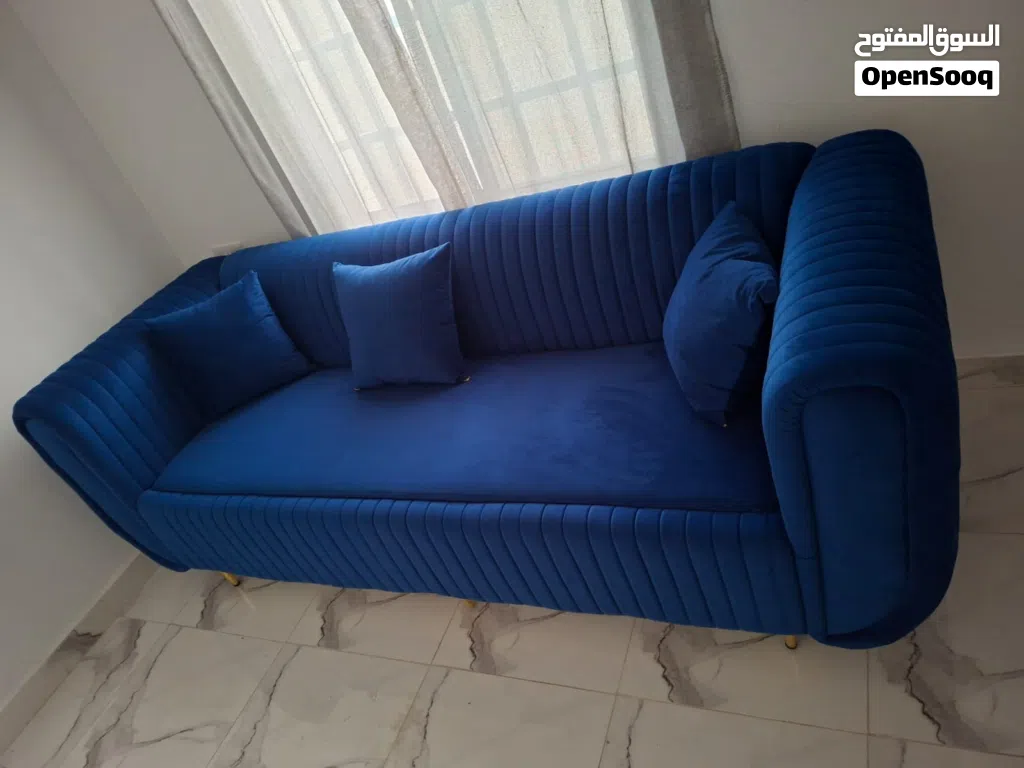 Royal blue velvet sofa