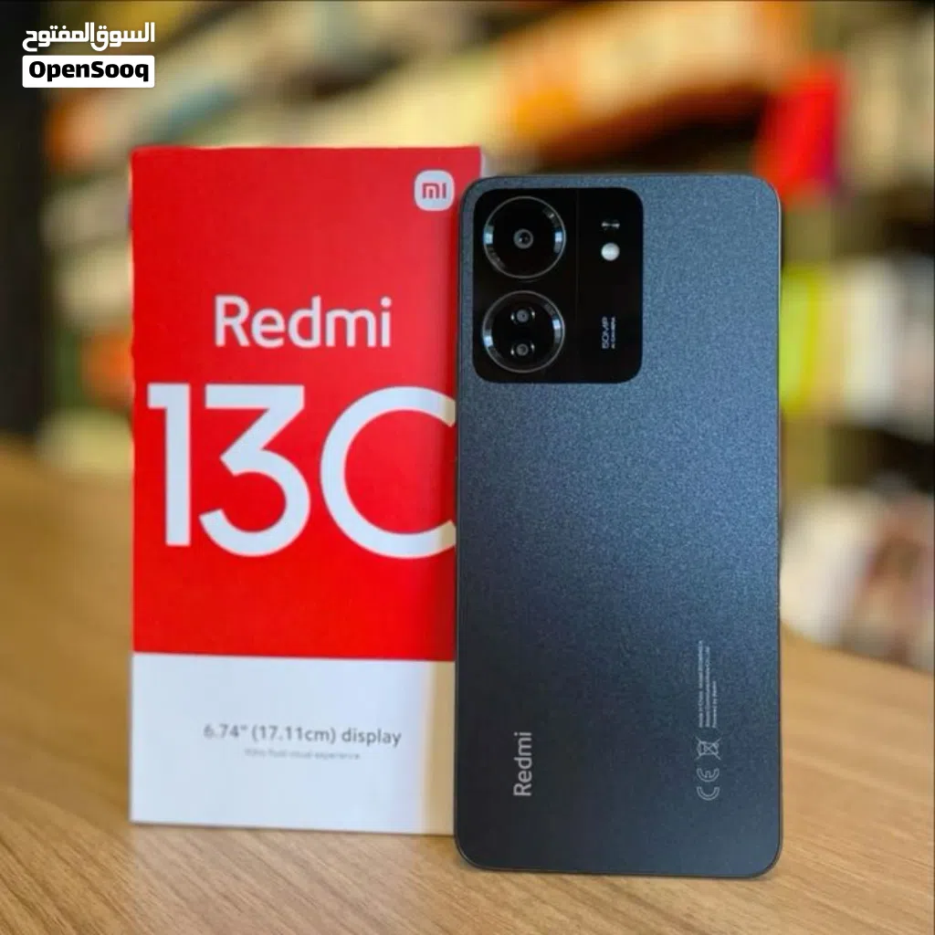 هاتف Mi Redmi 13C للبيع بسعر حرق التلفون ولا خدش جبار باللون الاسود مع سماعة ايربود هديه