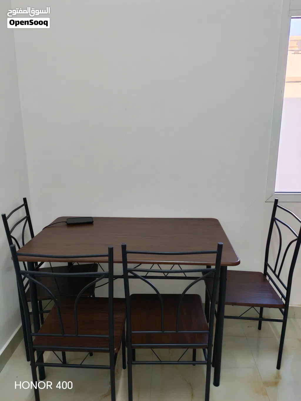 Wooden table with 4 steel chairs