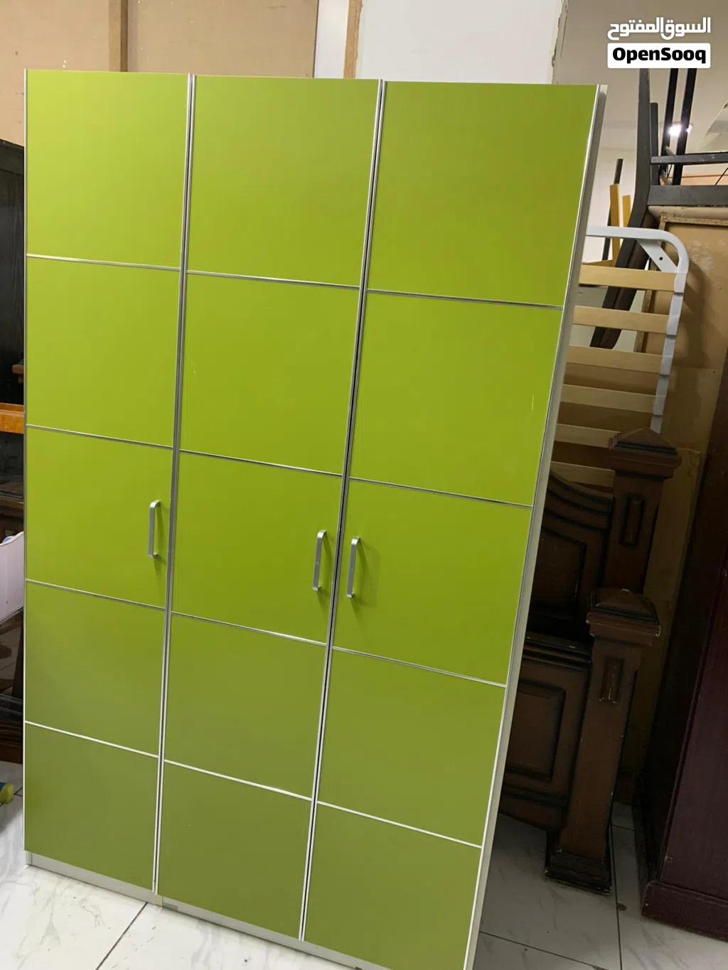 White and Green 3 door cupboard neat and clean with drawers