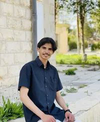 مأمون عمر  عدنان الغنميين