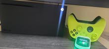 Xbox series x 1Tb with 2 controllers (black and green) + controllers charger/stand