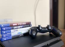 Ps4 slim 1Tb with 5 games Ps4 slim 1Tb with 5 games