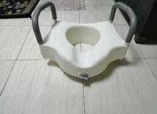 Elevated Toilet seat with Arms Elevated Toilet seat with Arms