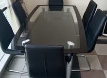 Glass Dinning Table with 6 Leather Chairs