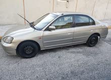 هوندا سيفيك موديل 2003 لون ذهبي جير عادي.