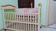 Juniors' Baby Crib + Juniors fine Sleep mattress + mother Care side Bumper