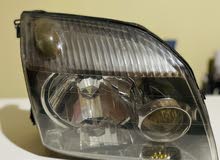 فانوس أمامي نيسان إكس تريل جديد لم يستعمل تايواني أسود -Nissan X Trail Front Lights- Black- New