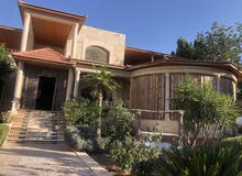700m2 More than 6 bedrooms Villa for Sale in Zarqa Dahiet Al Madena Al Monawwara