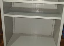 Metallic stand having shelves Metallic stand having shelves