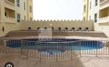 Furnished studio flat with gym, swimming pool and covered parking. Direct from Owner. 3300 AED
