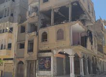 عمارة على شارعين مطلة على شارع الشويخات وشارع المهدوي عمارة على شارعين مطلة على شارع الشويخات وشارع المهدوي