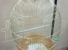 Golden cage with black hanger stand قفص Golden cage with black hanger stand قفص
