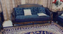Green sofa, blue sofa and coffee table Green sofa, blue sofa and coffee table