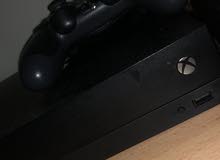 xbox one x with a controller xbox one x with a controller