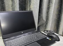 Hp pavilion gaming laptop with a gaming mouse