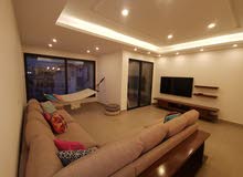 شقة مفروشة مطلة بعمارة حديثة راقية للايجار في عبدون Beautiful furnished apartment for rent in Abdoun