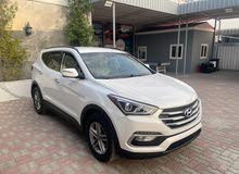 Hyundai Santa Fe Sport 4X4 سانتافي سبورت دفع رباعي  وارد أمريكي أوراق جمارك بصمة مقاعد كهربائية