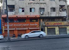 مجمع تجاري وسكني ب دخل 40 الف دينار سنوي