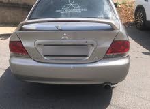 لانسر 2004 جير عادي الفحص موجود بالصور