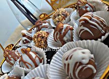 حلويات شعبيات بمكسرات وكريمه حلويات شعبيات بمكسرات وكريمه