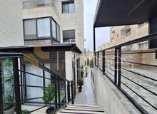 شقة مع حديقه بالاضافة الى كراج خاص للبيع في ضاحية الامير راشد