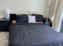 queen size bed with comfortable mattress no side tables
