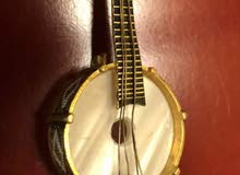Gold and mother of pearl banjo musical instrument pin USA
Over 100 years old Gold and mother of pearl banjo musical instrument pin USA
Over 100 years old